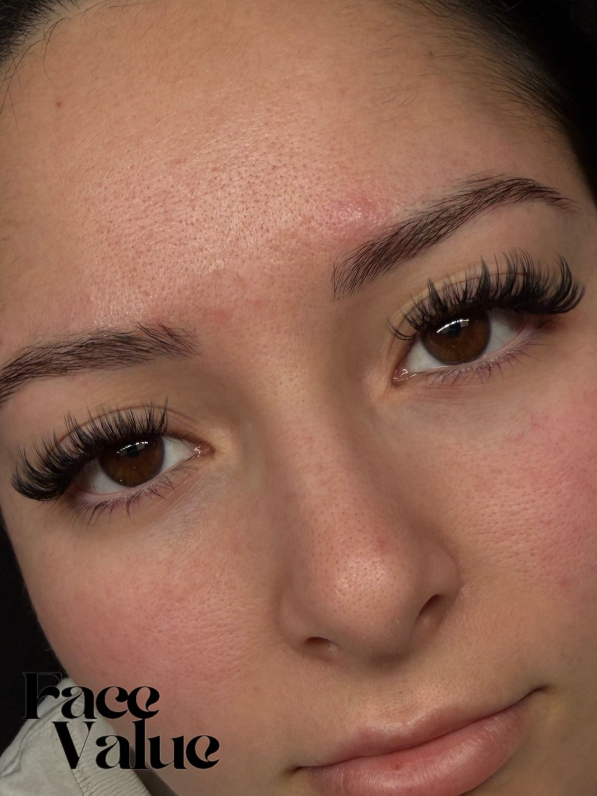 Soft lash set on a client looking up