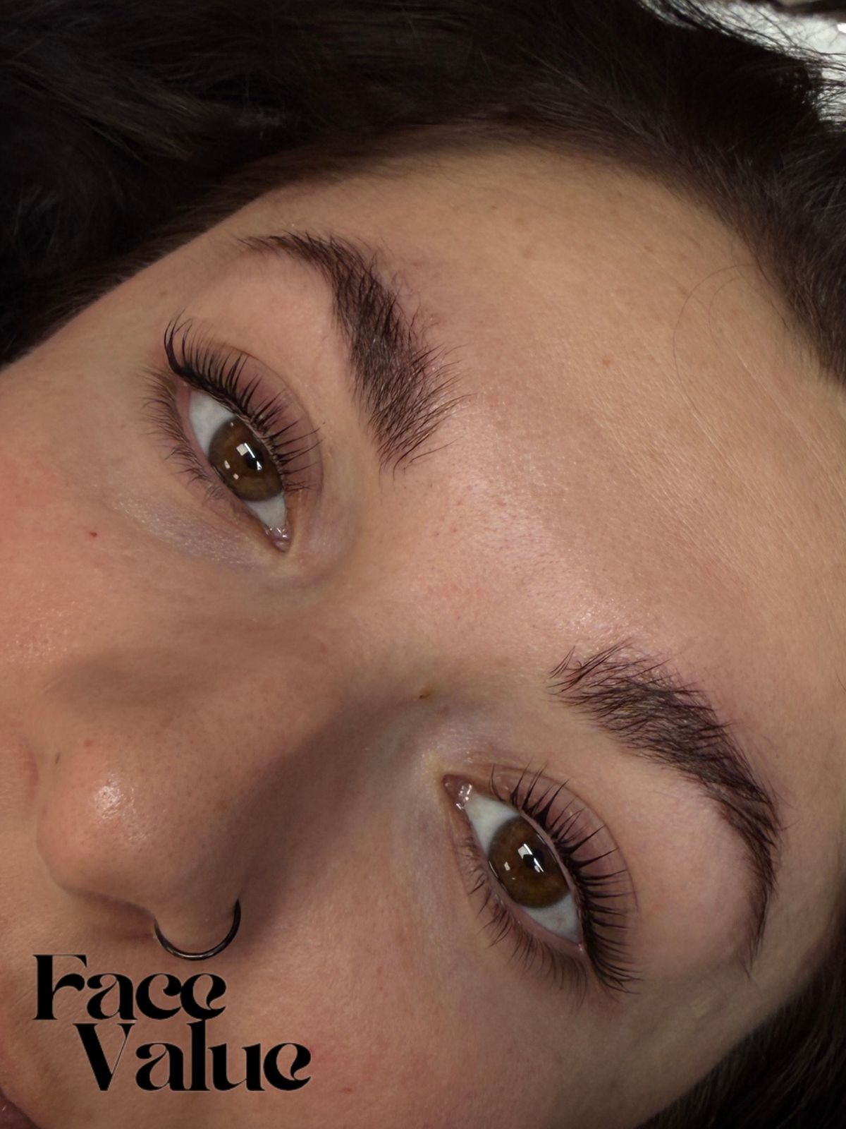 Lash set with a nose stud in frame